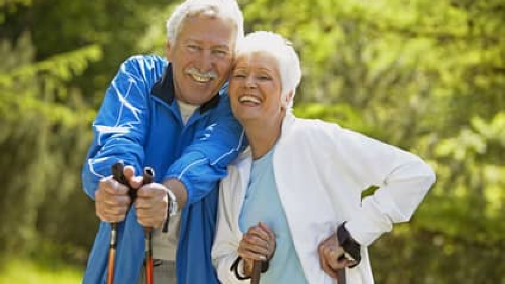 Senior couple doing Nordic walking