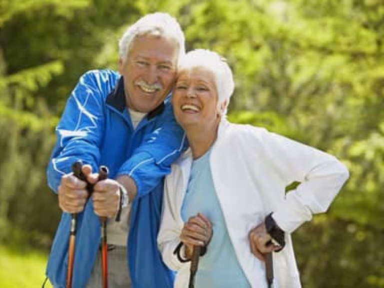 Senior couple doing Nordic walking