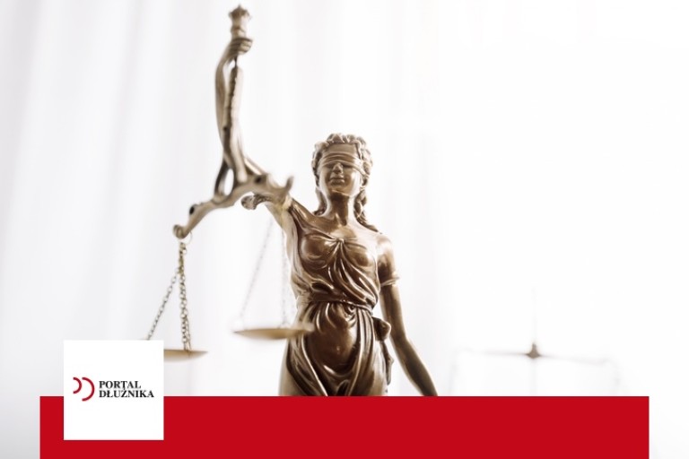 Nakaz zapłaty co robić dalej Justice and law concept.Male judge in a courtroom with the gavel, working with, computer and docking keyboard, eyeglasses, on table in morning light
