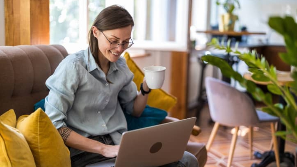 Young woman using a laptop at home