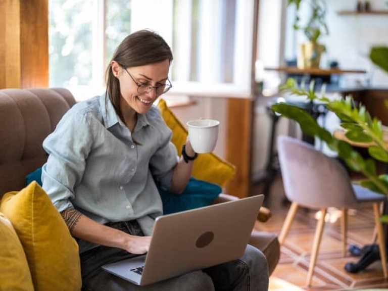 Young woman using a laptop at home