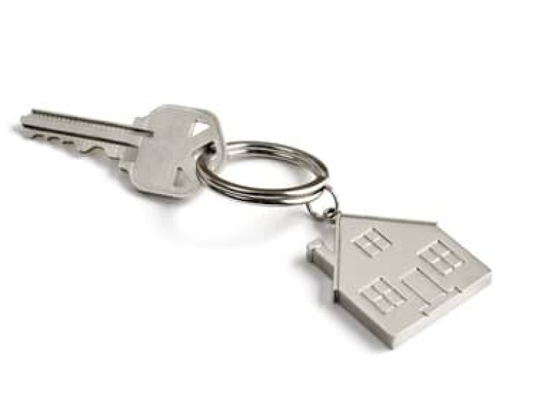 metal key with house key ring