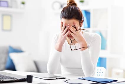 Woman working in her home office