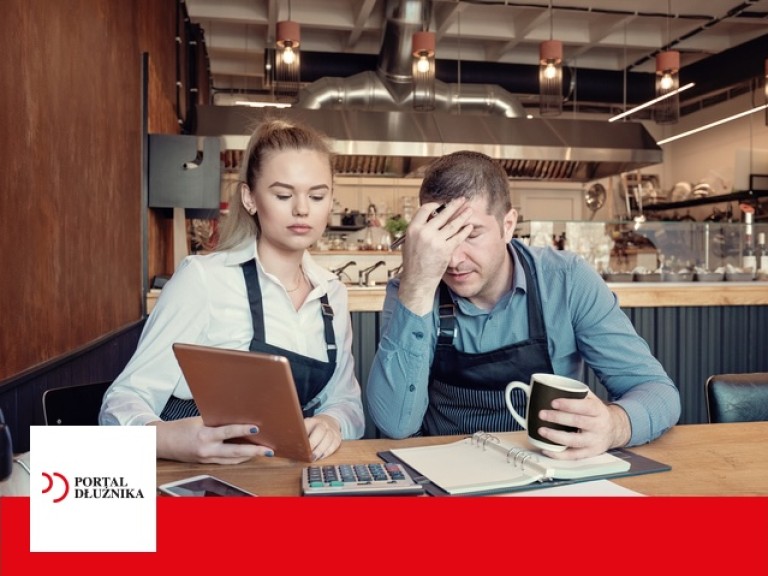 Depressed male and female entrepreneurs overwhelmed by finance problems - Nervous manager checking restaurant finance - Failure in small-business concept Depressed two entrepreneurs man and woman inside their restaurant overwhelmed by finance problems