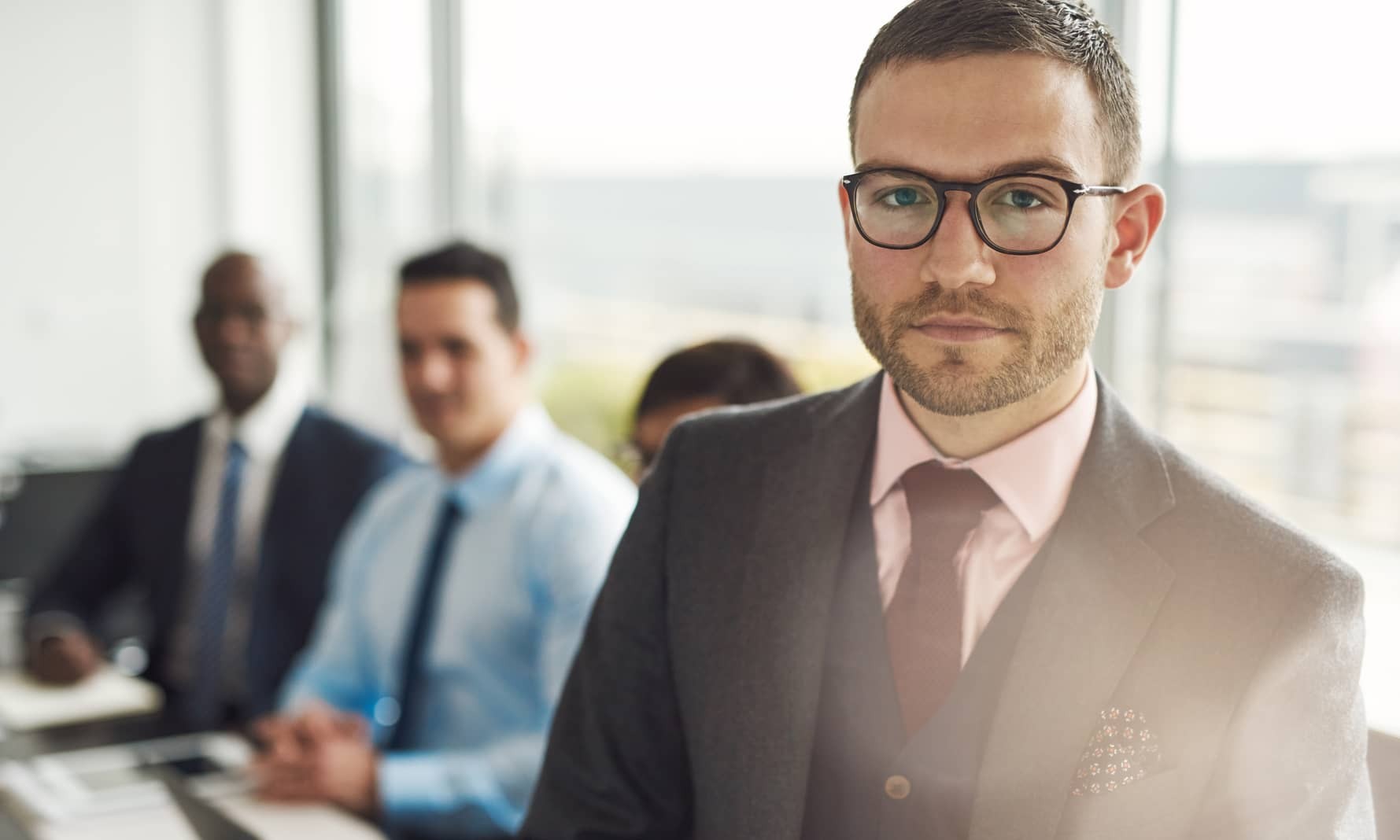 Serious young businessman in a meeting