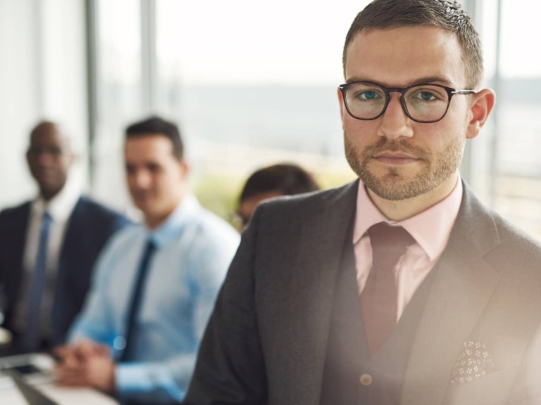 Serious young businessman in a meeting