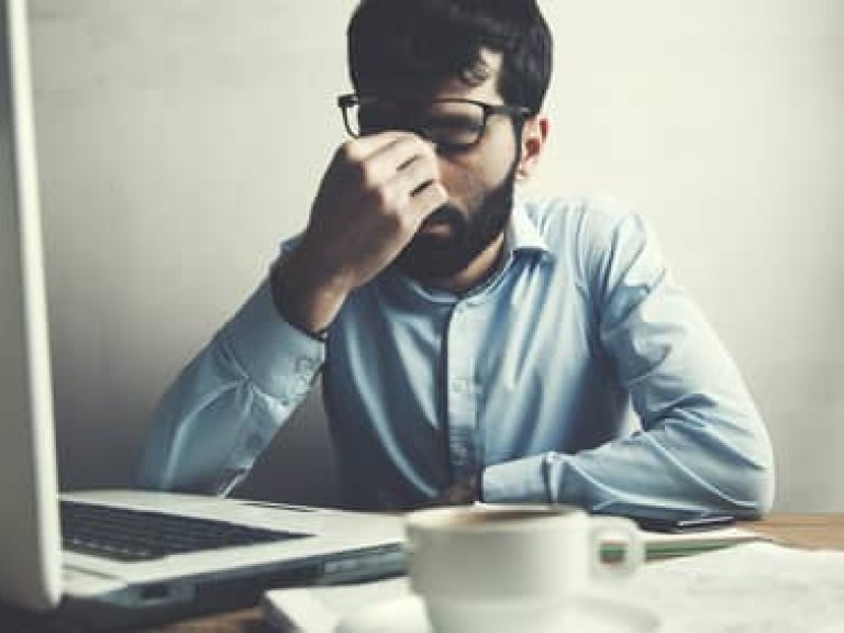 Businessman having a headache